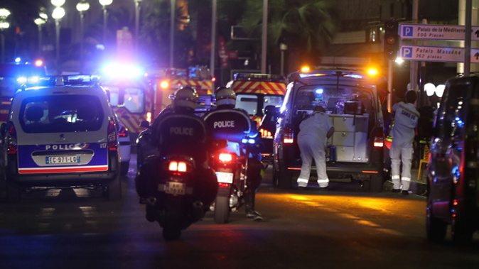 Emergency services respond after a lorry drives through crowds at celebrations in Nice. (Getty Images)