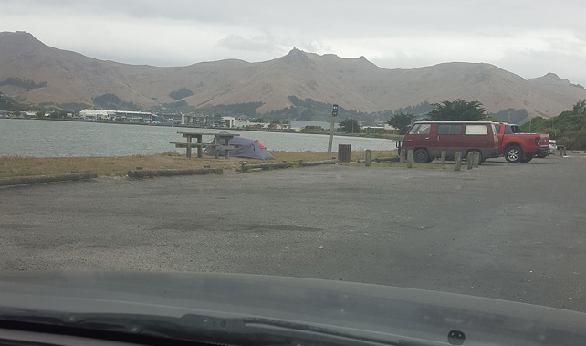 Freedom campers spotted with a tent pitched on the side of an estuary (Supplied)