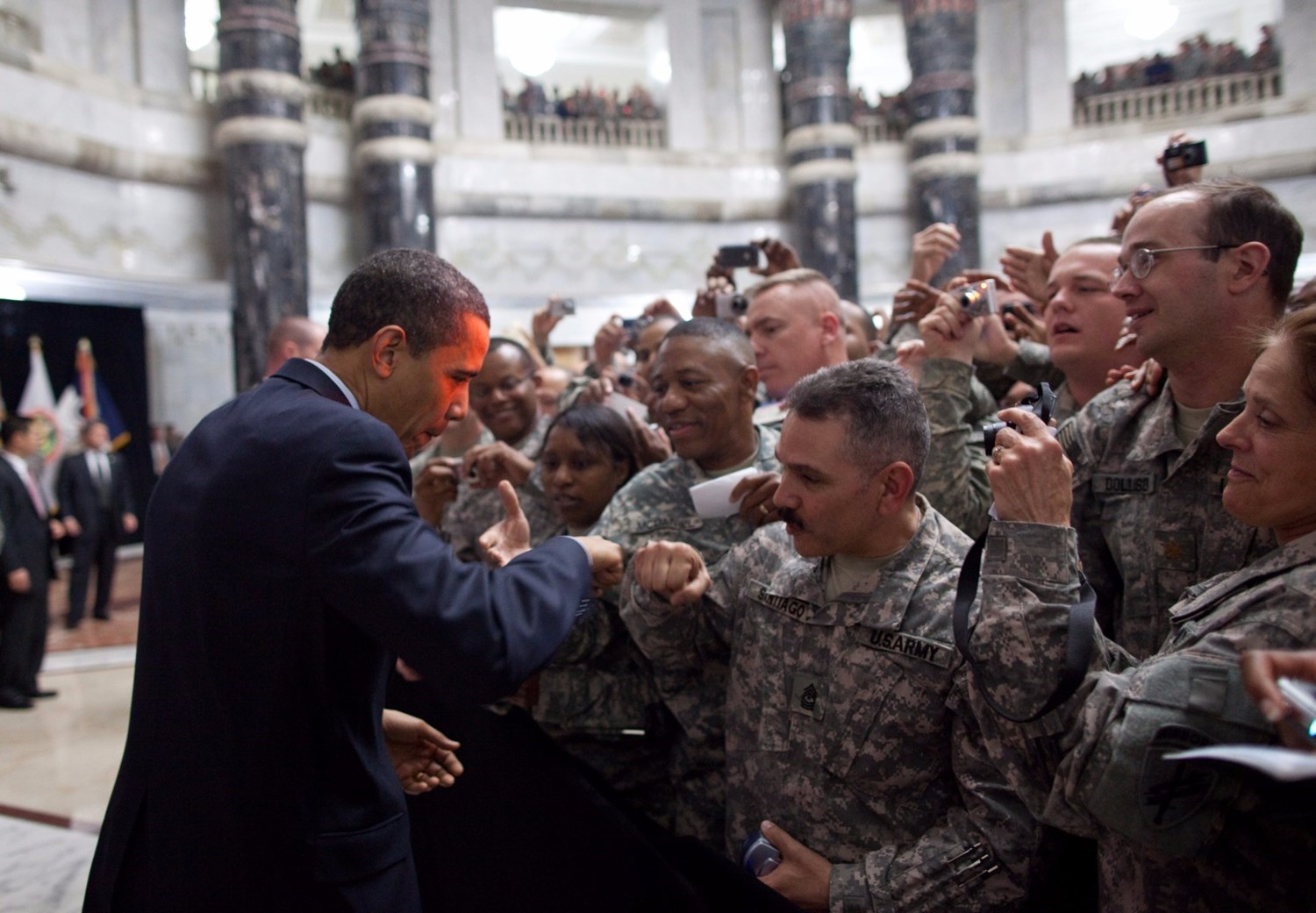 April 7, 2009 “President Obama fist-bumps a U.S. soldier at Camp Victory in Baghdad. The President was treated to an overwhelming reception by the troops.”