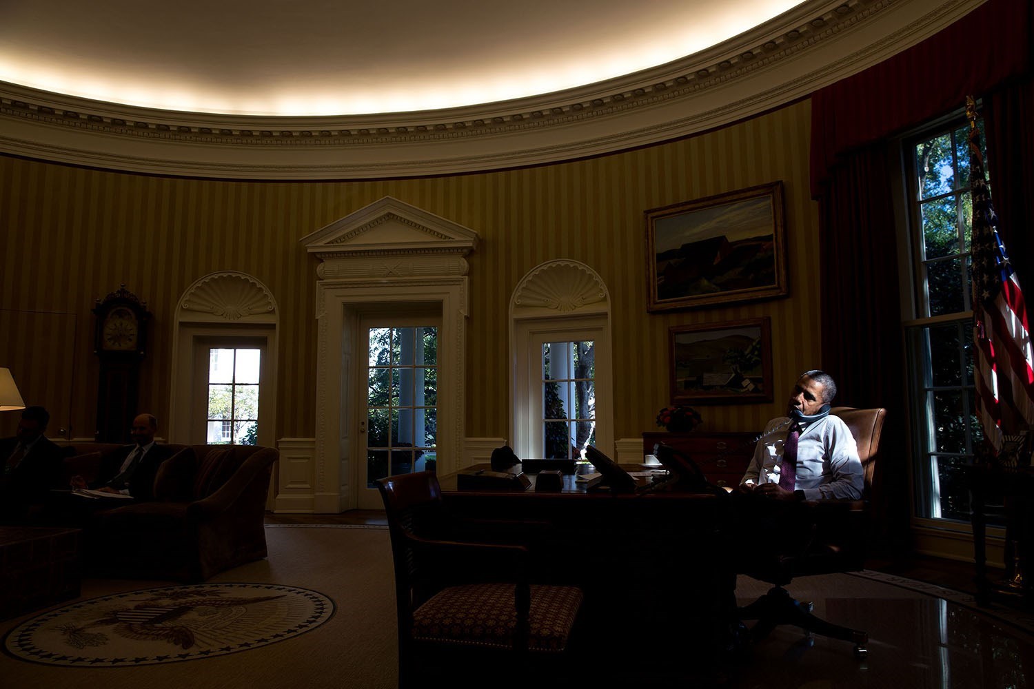 Oct. 16, 2015 "During the autumn months, as the sun dips lower in the sky, the light in the Oval Office changes throughout the day. Here, late one afternoon, the sun illuminated the President as he spoke on the telephone with Abu Dhabi Crown Prince Sheikh Mohammed Bin Zayed Al Nahyan."