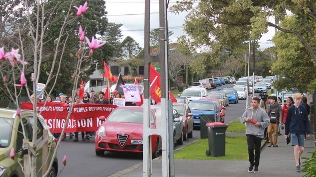 Traffic backed up behind the group, though there were some supportive toots from passing motorists. 
