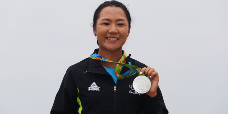 Silver medalist Lydia Ko poses on the podium during the medal ceremony for Women's Golf event in Rio. (NZ Herald/Getty Images)