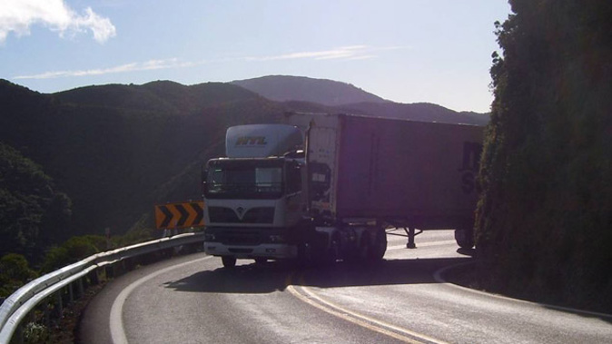 Road Transport Association area executive Sandy Walker said drivers had no choice but to cross the centre line to get around Rimutaka Hill Road’s tight corners in their longer trucks (Supplied)