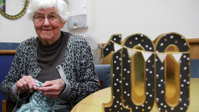 Still knitting: Carter House resident Barbara Falconer turned 100 on Tuesday. Photo / Stuart Whitaker
