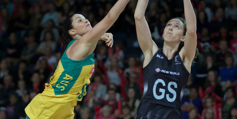 Silver Ferns shooter Bailey Mes gets over the top of Sharni Layton of Australia. (NZ Herald/Photosport)