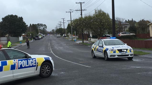 An armed Police cordon in Upper Vogeltown, New Plymouth (Josh Price)