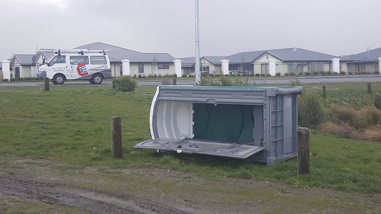 Portaloo blown over in Christchurch (Philip East) 