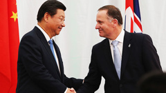 PM John Key shaking hands with President Xi of China (Getty Images)