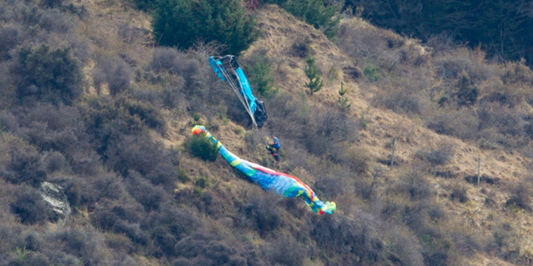 Two people were injured in a paragliding accident on Coronet Peak in Queenstown today. Photo / James Allan