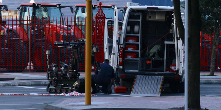 The defence bomb disposal robot on Quay Street in Central Auckland after a suspicious package was found during the commuter rush hour. Photo / Nick Reed