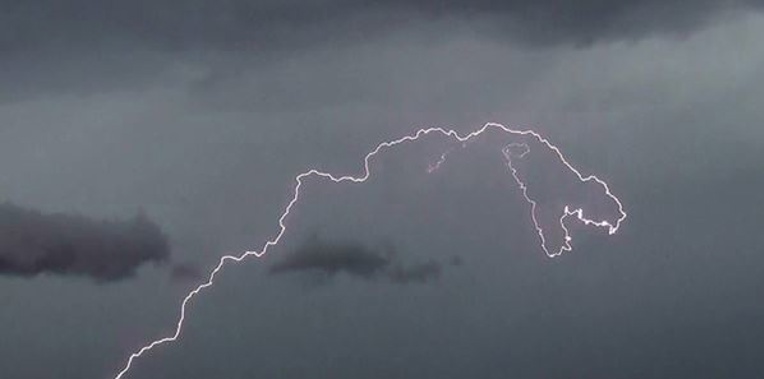 Tonight's storm was accompanied by multiple lighting strikes. Photo / Supplied