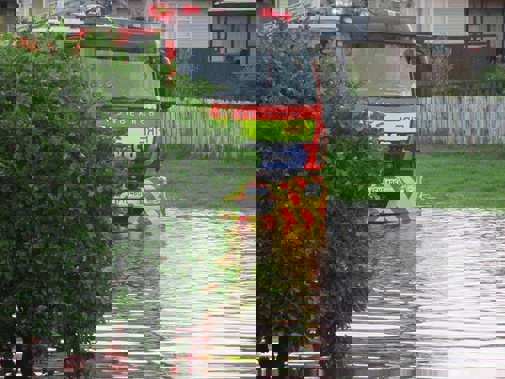 Emergency services make their way through floodwater in Huntly. (Supplied)