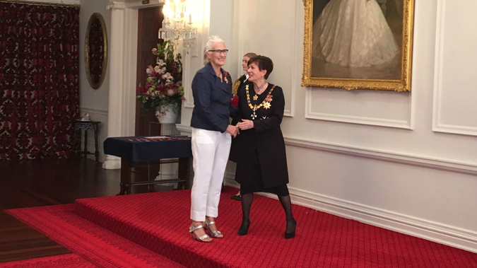 Dame Jane Campion shakes the hand of Governor General Dame Patsy Reddy at Government House in Wellington (Photo / Georgia Nelson)