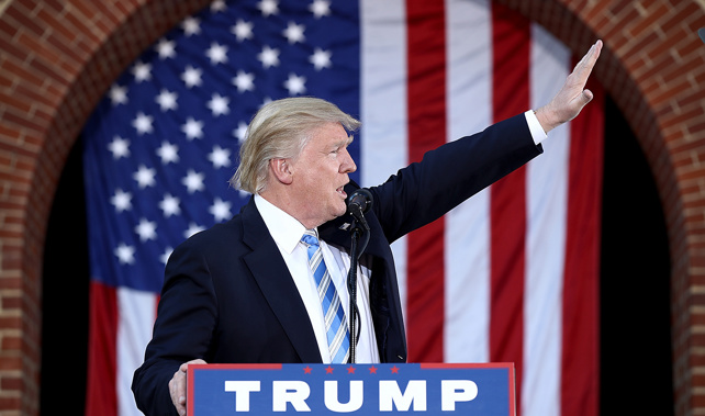 Donald Trump using his small hands during a campaign rally in Virginia (Getty Images) 