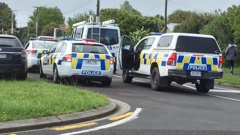 Police at the scene in Hamilton (Belinda Feek)
