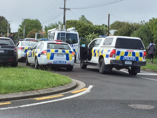 Police at the scene in Hamilton (Belinda Feek)
