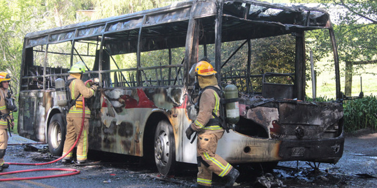 Fire service personnel attend a school bus fire on Paton Rd in Richmond near Nelson. Photo / Nelson Live