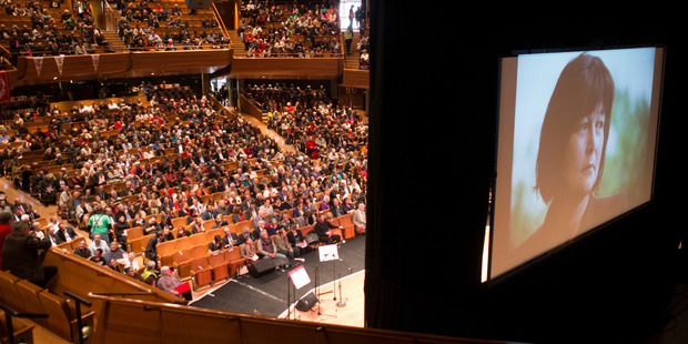 A portrait of Helen Kelly on the screen during her memorial service at the Michael Fowler Centre in Wellington. Photo / Mark Mitchell