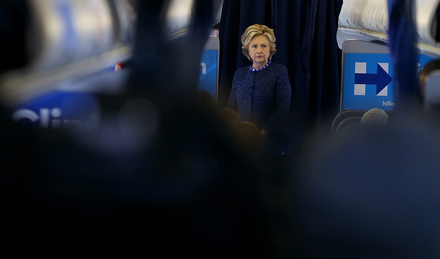 Clinton aboard her plane in New York (Getty Images) 