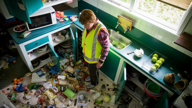 Waiau School principal Mary Kimber amongst the devastation in the school house where she lives, after an earthquake stuck New Zealand overnight. Photo / Mike Scott