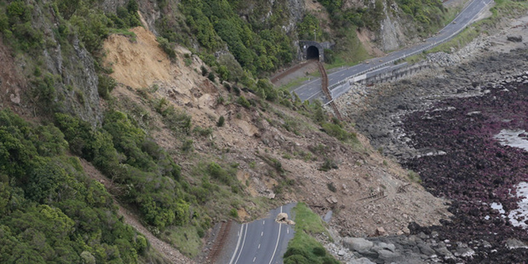 Huge slips, caused by the 7.8 earthquake, blocking State Highway One north of Kaikoura. Photo / Mark Mitchell.