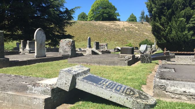 Gravestones and memorial pillars have toppled in earthquake-battered Waiau's local cemetery (Kurt Bayer)