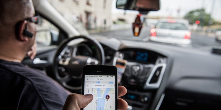 Executives from ridesharing company Uber appeared at Parliament today.