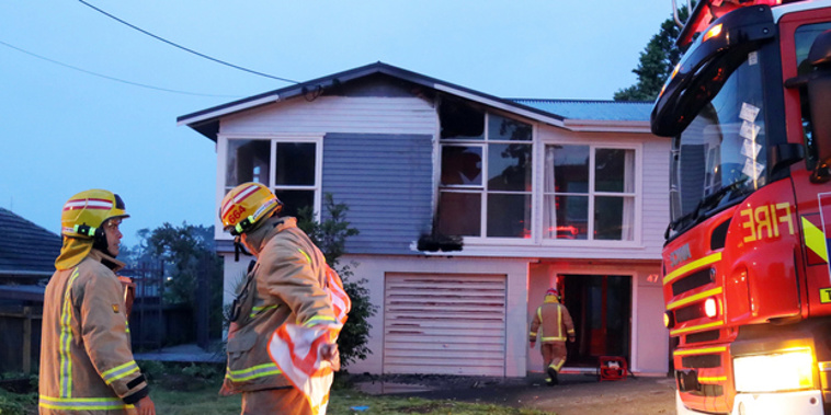 A suspicious house fire being investigated by police in West Auckland is the same address where a woman was stabbed to death last month. Photo / SNPA