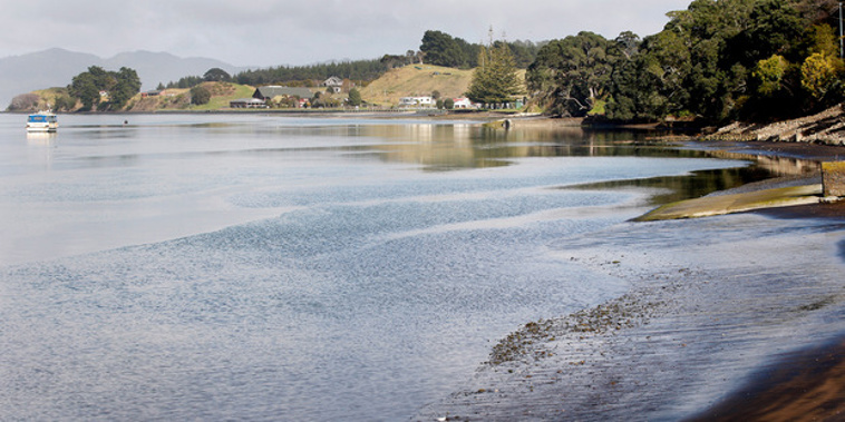 Four people have been rescued after their boat capsized crossing the Kawhia bar. Photo of Kawhia Harbour / Christine Cornege