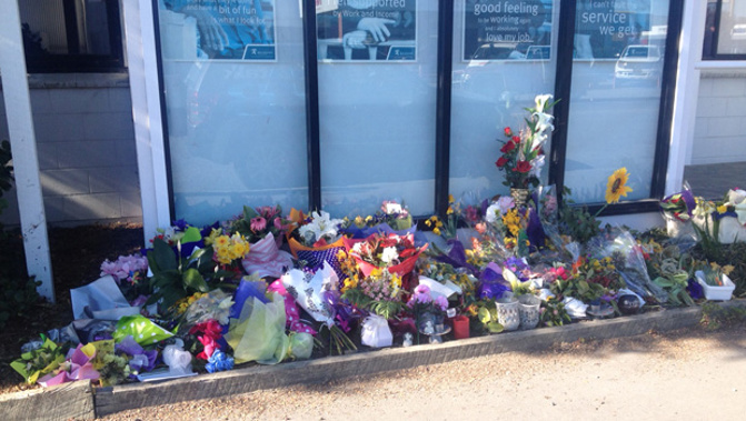 Flowers outside the Ashburton WINZ office after the shooting of Peggy Noble and Leigh Cleveland (File photo)