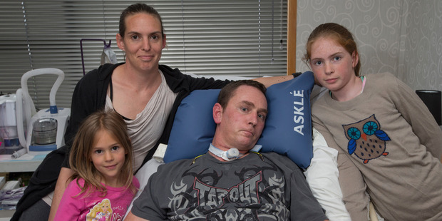 Paul Anderson with his partner, Vashti Faulkner, and daughters, Violet and Laurel. (NZ Herald)