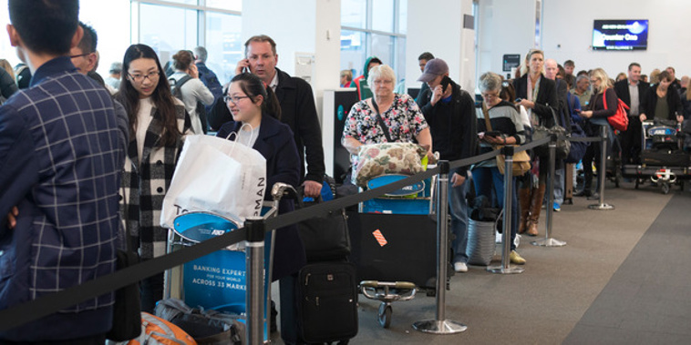 Passengers have vented their frustration at the traffic chaos at Auckland Airport, which saw some some missing their flights. (NZ Herald/Mark Mitchell)