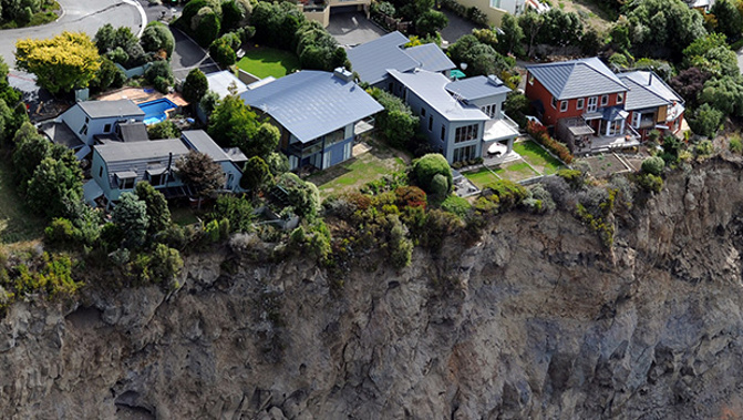 Houses in Redcliffs balance on the edge of a cliff after the 2011 earthquake (Getty Images)