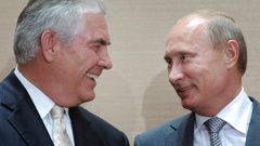 Russian President - then Prime Minister - Vladimir Putin, right, and Rex Tillerson, ExxonMobil's chief executive in 2011. Photo / AP / NZH