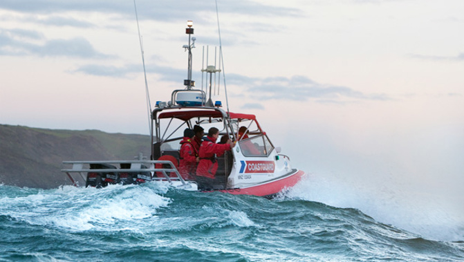 The search for the fisherman missing at Lake Ferry has been suspended for the day. (Supplied)