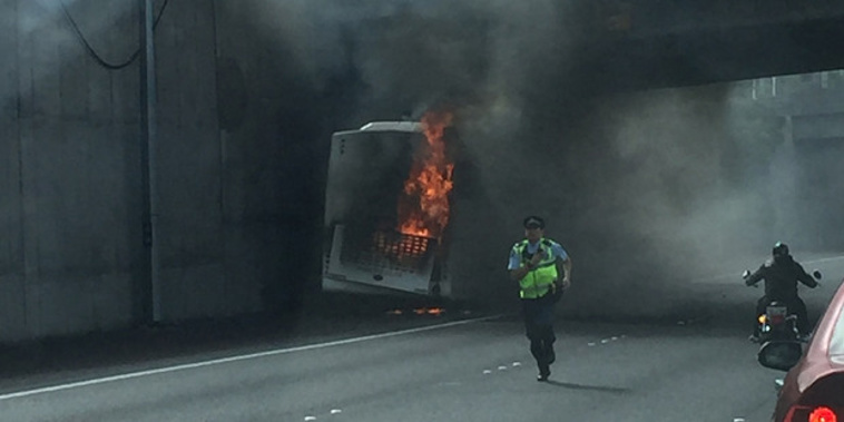 Bus fire at Greenlane interchange. (NZ Herald/Supplied via H. Baker)