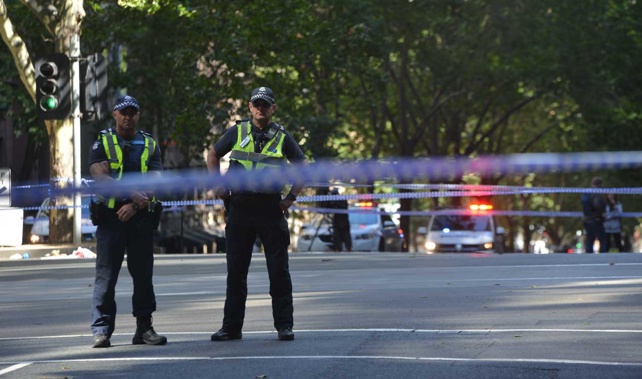 Police stand guard at the scene (Getty Images)