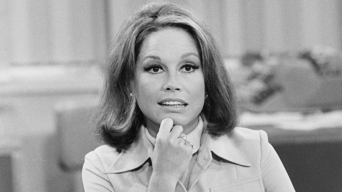 American actress Mary Tyler Moore (as Mary Richards) sits at her desk in a scene from 'The Mary Tyler Moore Show' (also known as 'Mary Tyler Moore'), Los Angeles, California, mid 1970s. (Photo by CBS Photo Archive/Getty Images)
