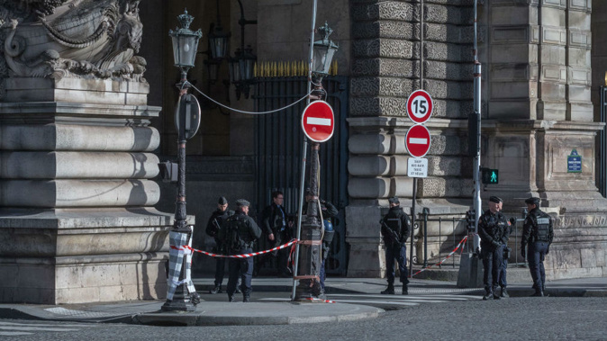 Police secure the scene outside the Louvre (Getty Images)