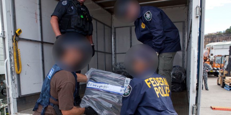 Australian Federal agents with the seized contraband (Supplied) 