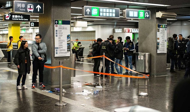 olice officers stand guard inside the station (Getty Images) 