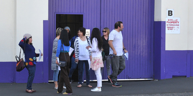 Cadbury Dunedin Staff leave the factory after a meeting. Photo / Otago Daily Times