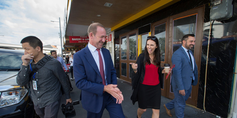 Labour Party leader, Andrew Little walks with MP Jacinda Ardern along Sandringham Rd during the Mt Albert byelection campaign. NZH photo Nick Reed