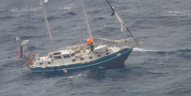 The stricken yacht from which the couple were rescued from. (NZ Herald)