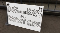 A sign at the rape culture protest in Wellington takes aim at the old saying: 'Boys will be boys'. (Melissa Nightingale)