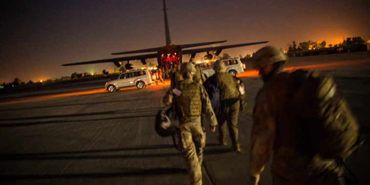 New Zealand Defence Force troops board a C-130 Hercules at Taji Military Base, Iraq, this morning (Audrey Young)
