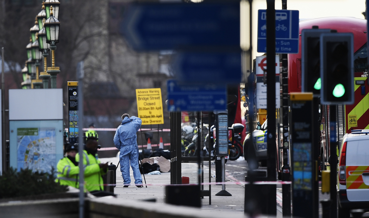 Police investigators seen on Westminster Bridge (Getty Images) 