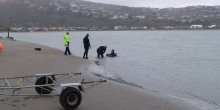 A woman's body has been recovered from a car that left the road and went into the sea in Christchurch. Photo / Christchurch Star