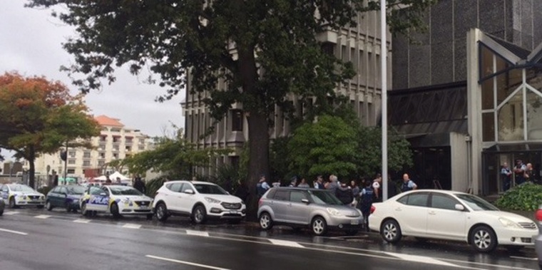 Dramatic scenes inside and outside Christchurch District court today. (NZH)