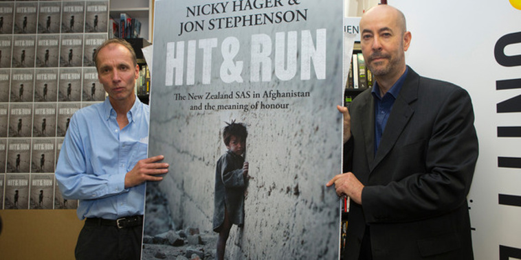 Authors Nicky Hager, left, and Jon Stephenson with their book, 'Hit & Run' (Mark Mitchell).